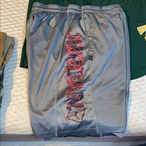 Two pairs of basketball shorts